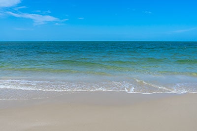Waves coming towards the sand at Manasota Beach